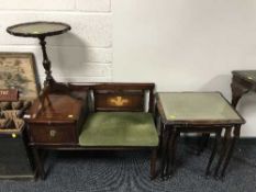 A telephone table, a nest of three tables,