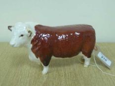 A Beswick figure - Hereford Bull, model 1363A, First Version (horns protrude from ears), gloss.