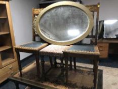 AN oval mirror,