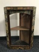 Two triangular carved wall shelves and a glazed corner cabinet
