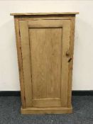 A reclaimed pine single door cupboard