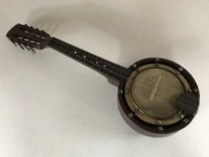 A miniature eight string banjo
