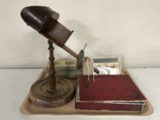 A 19th century Stereoscope on original stand with approx 75 stereo view cards and a box of glass