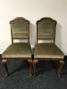 A set of four antique mahogany chairs