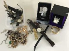 A quantity of lady's and gent's wrist watches and a collection of silver costume jewellery