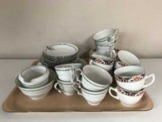 A tray of two continental china tea services