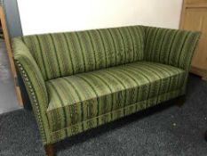 Two seater settee in green fabric
