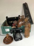 A box of wooden figures, pipe rack, Bakelite telephone, stone ware flaggon,