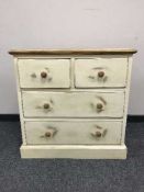 A Victorian style four drawer chest