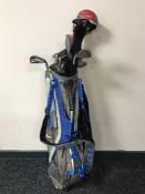 A Nike golf bag and set of Ping iron,