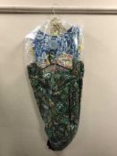 A full rail of vintage dresses, 50's style,