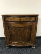 A late 19th century walnut cabinet fitted a drawer