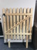 A pine garden gate headboard