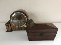 A walnut dome topped mantel clock together with a Victorian rosewood tea caddy