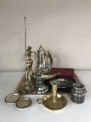 A plated teapot with burner on stand, Norwegian pewter candle holders, brass candlesticks,