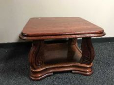 A reproduction mahogany lamp table