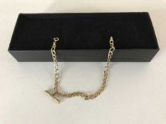 A 9ct gold T-bar bracelet