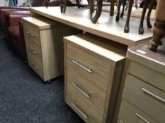 An office desk and two x three drawer pedestals