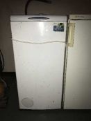 A Whirlpool top loading washing machine