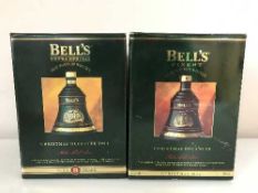 Two boxed Bells Whisky decanters;