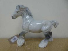 A Beswick figure - Cantering Shire Horse model 975, grey gloss.