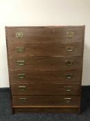 A teak six drawer chest