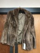 A vintage lady's musquash fur coat