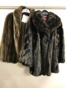 A full rail of vintage coats,