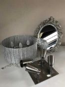 A box containing two contemporary light fittings, one with glass drops,