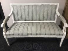 A white painted two seater salon settee