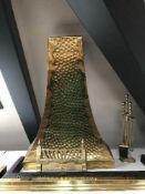 Two antique fire curbs together with a companion set,