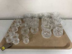 A tray of nineteen Edinburgh crystal glasses
