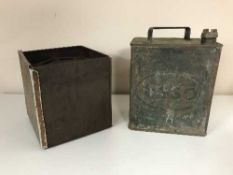 A box of Primus stove and vintage Esso oil can