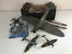 A box of assorted die cast air craft and ships