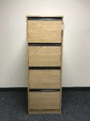 Four drawer wood effect filing cabinet with key