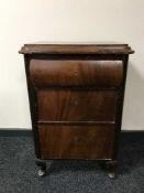 A mahogany three drawer chest