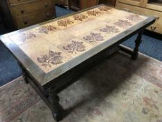 A large oak tiled topped coffee table