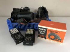 A basket of cameras, film loaders,
