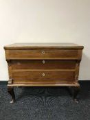 A late Victorian three drawer chest