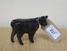 A Beswick figure - Aberdeen Angus Calf, model 1827A, gloss.
