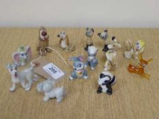 A collection of Wade and other animal whimsie figures, Disney etc.