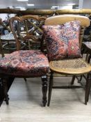 A Victorian balloon chair and begere bedroom chair