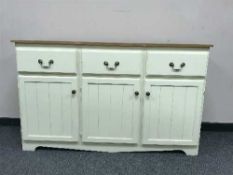 A painted pine dresser fitted three drawers