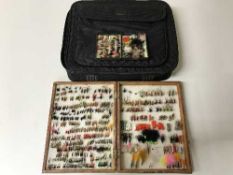 Two cases of assorted assorted fishing flies and a carry bag