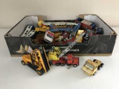 A box of heavy gauge die cast play worn vehicles