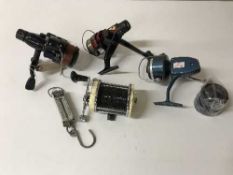 A box of three spinning reels,