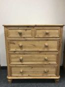 A pine five drawer chest