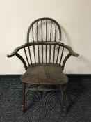 An antique Windsor style chair