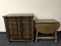A carved oak four drawer chest and a oak drop leaf table
