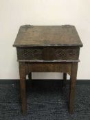 An 18th century and later oak bible box on stand